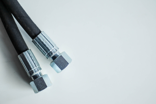Hydraulic,metal,hose,ends,on,white,background.,closeup,macro,detail